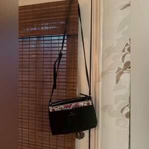 Black crossbody purse with floral clutch